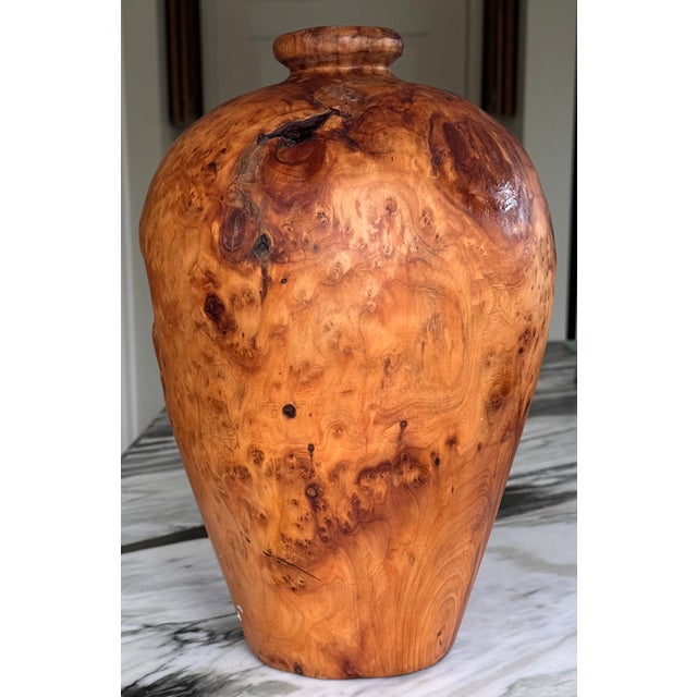 With a uniqueness that can only be found in nature, here is a statement piece in the form of a burlwood vase, distributed...