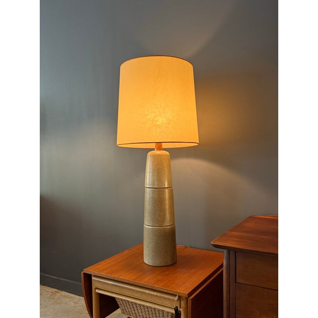 An oversize table lamp from the husband and wife legacy duo of Indianapolis’ Marshall Studios. Original shade included