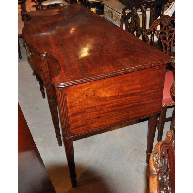 This listing is for a early 19th Century George III magnificently figured Cuban mahogany sideboard. -Bowfront original...