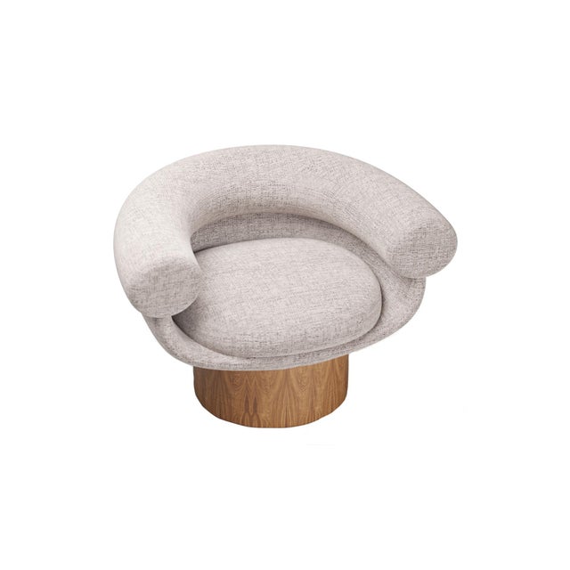 This chair owes its name to its bowl shape. Its soft lines and curves are enhanced by the warmth of the wood used to make...