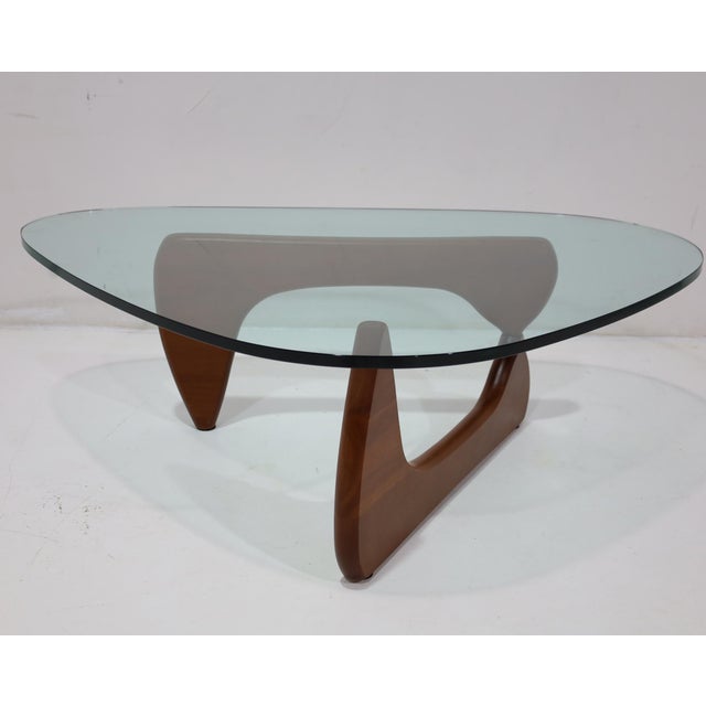 The Noguchi table by Isamu Noguchi for Herman Miller in walnut. Probably one of Noguchi's most iconic designs. The Noguchi...