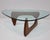 The Noguchi table by Isamu Noguchi for Herman Miller in walnut. Probably one of Noguchi's most iconic designs. The Noguchi...