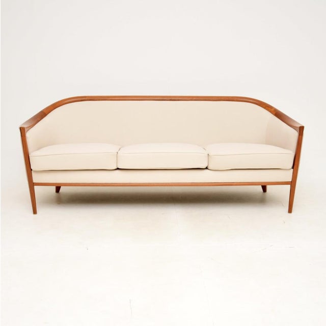 An absolutely stunning Swedish vintage teak sofa by Bertil Fridhagen. This was made in Sweden by Broderna Andersson in the...