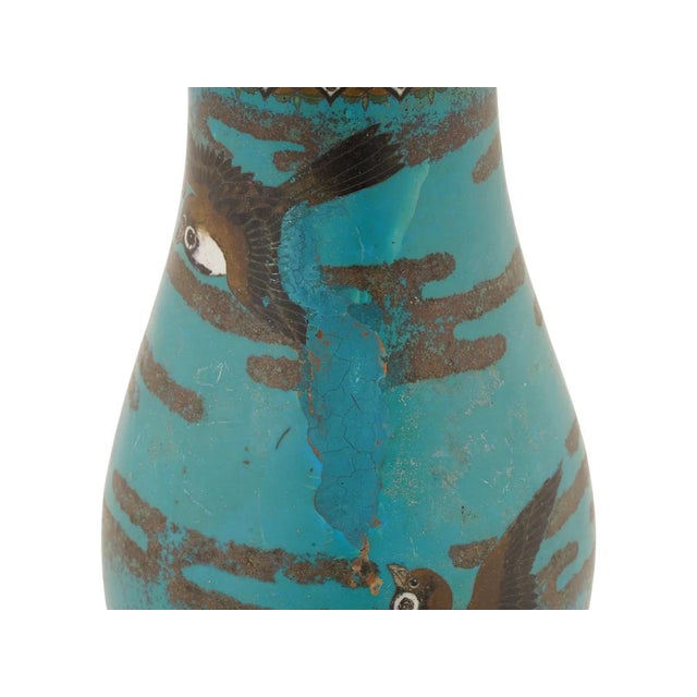 A Japanese cloisonné enamel vase from the Meiji period, produced within the Nagoya school, and decorated with stylized...