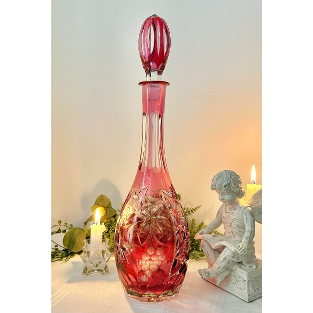 This is for a Vintage Traube Nachtmann Decanter in Cranberry Red. This is a large stately round decanter with a matching...