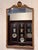 19th century French giltwood mirror with an arched top crowned by a carved shell crest flanked by scrolls and flowers. The...