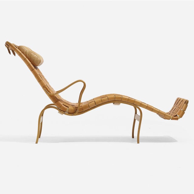 An exceptional Pernilla 3 lounge chair by Swedish designer Bruno Mathsson, produced by Firma Karl Mathsson in Sweden and...