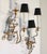 Stunning pair of sconces in the Maison Bagues style by Banci Firenze. Two lights per sconce. Decorative motifs in mirrored...