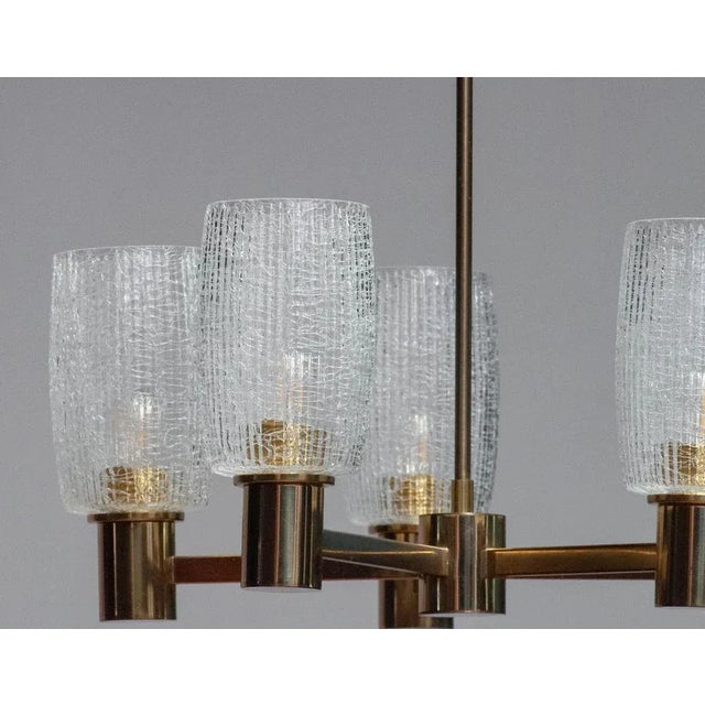 Beautiful brass chandelier manufactured in Germany by Doria in the 1960s. The five large ( 15 cm / 5.91 inches height and...