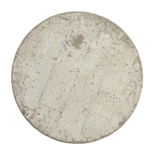 Modern round reclaimed pine wood side table on hand hammered iron base. Antiqued distressed white finish on wood. Each...