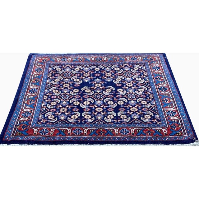 ACTUAL SIZE: 2’0″ x 2’4″ PRIMARY COLOR: Navy / Rust AGE: Old MATERIALS: Wool FOUNDATION: Cotton PRODUCTION: Handwoven,...