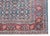A fantastic early 20th century Persian Kashan rug with an all-over trellis floral pattern with myriad flowers, leaves, and...