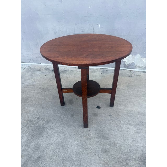L& JG Stickley Round Missio Oak Center Table with original finish sold as found showing normal signs of use unrestored,...