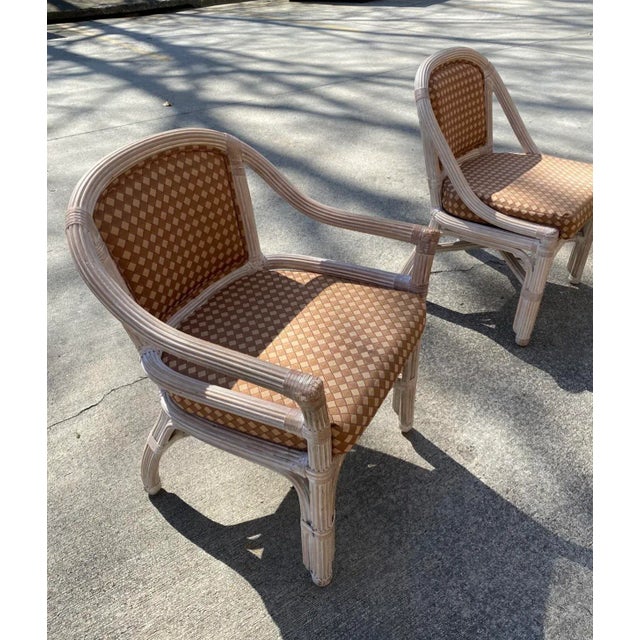 This is a beautiful vintage reed dining set which includes a glass top table and 6 cushioned chairs. Perfect for the...