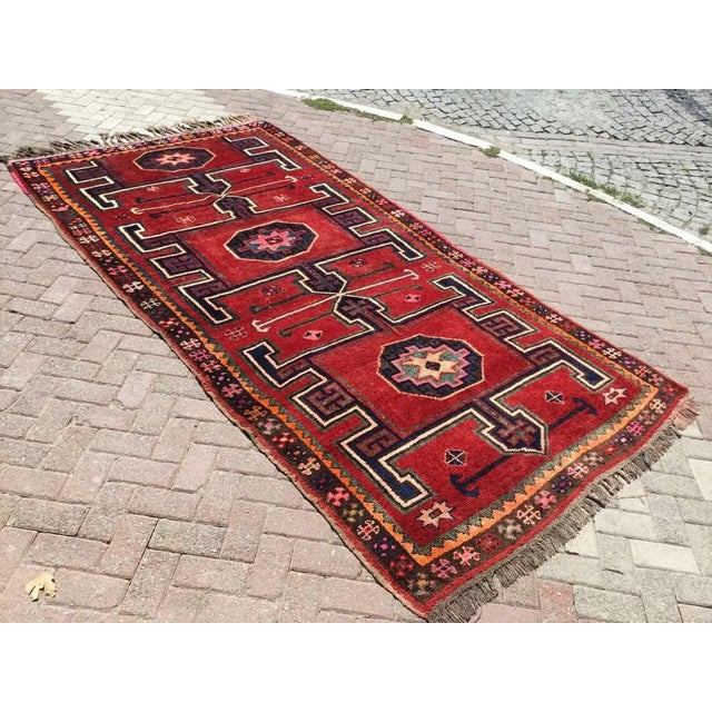 This gorgeous hand knotted Vintage Anatolian area rug is approximately 60 years old in excellent vintage condition. The...