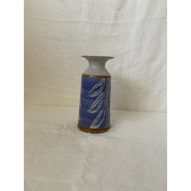 Purple ceramic vase with white leaf design and speckled finish. Signed by artist. Great condition, no cracks or chips....