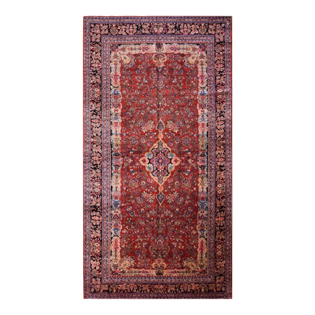 Distinctive Kazvin Motif on a Red-Scarlet Background Color With Masterful Medallion Design Antique Persian Rug For Sale