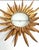 Large Spanish sunburst light in gilt metal and frosted glass ; white ; opaline Spain, 1950s. Midcentury antique gilt iron...