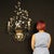 Large Italian wall light from the second half of the 20th century. Crafted from iron, brass, crystal, and glass, this...