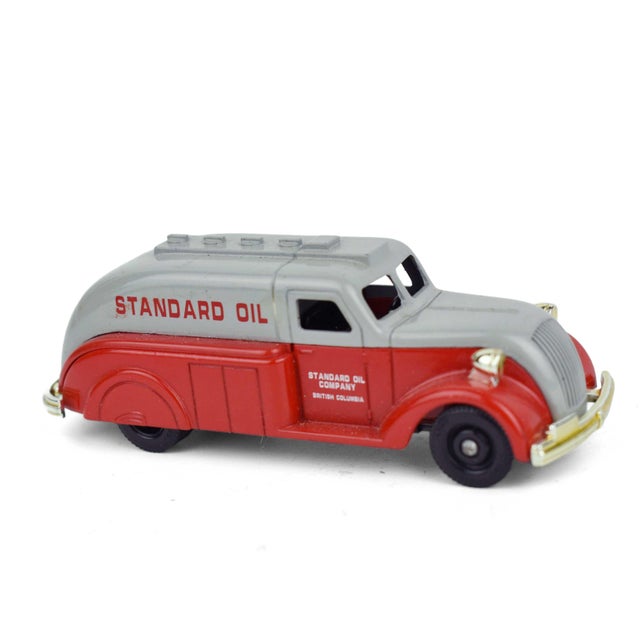 This set of three vintage die-cast service vehicles offers a nostalgic look at mid-century industrial Americana, featuring...
