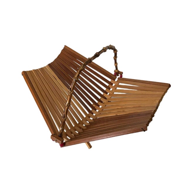 Fabulous midcentury folding bamboo basket bowl. Bamboo handle with beadwork.