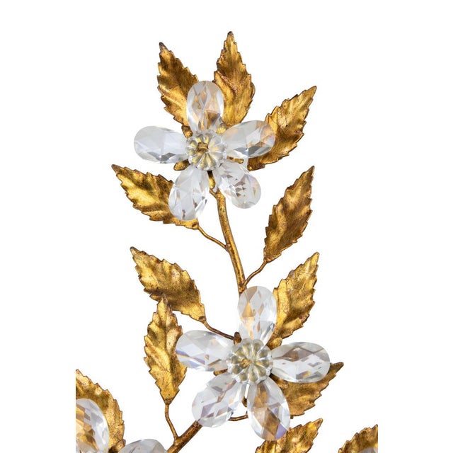 Gilded Brass Applique in the style of Hans Kogl, late 20th Century. 2 lights, with cristal drops in the shape of flowers....