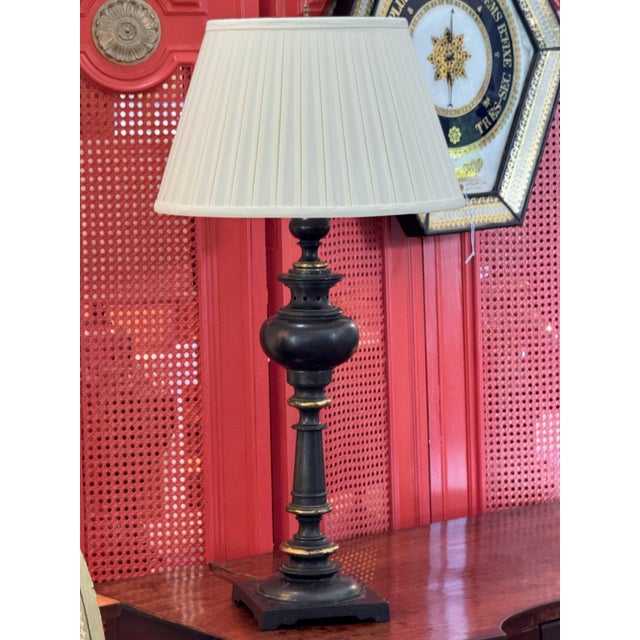 19th century French bronze table lamp with a turned column tapering up to a rounded urn shaped section with a pierced...