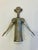 Designed by Aldo Columbo, Italy in the 80’s You raise the arms to remove the cork Pierre is silver plate wearing a bow tie...