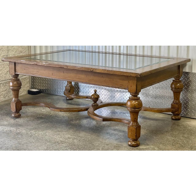 Stunning William and Mary style oversized coffee table. Robustly turned solid wood legs joined with a stretcher base...
