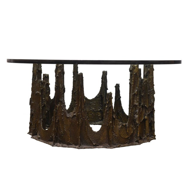 This signed and dated vintage bronze stalagmite cocktail table or side table is by Paul Evans. Signed PE and dated "76. It...