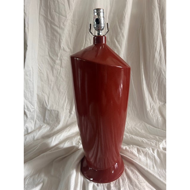 Asymmetrical postmodern ceramic table lamp in a rich oxblood with black speckle colorway. Features an Hb maker’s mark....