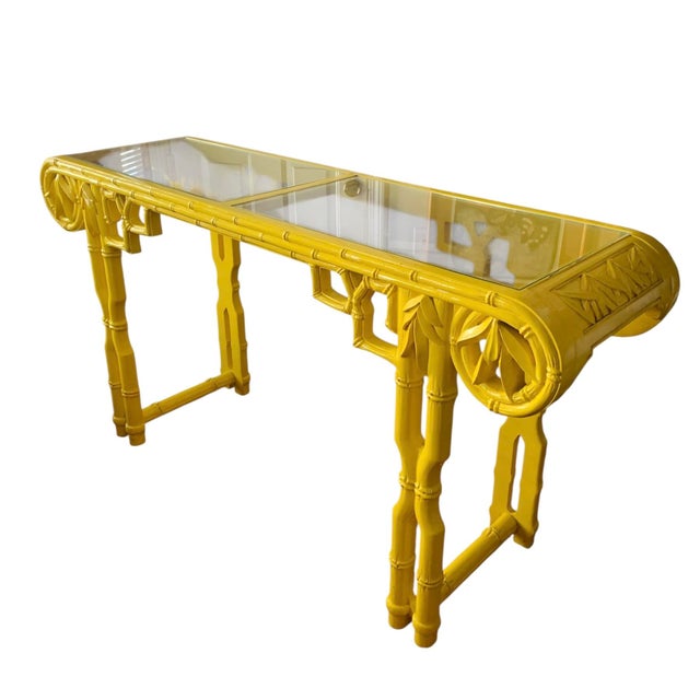 Add some sunshine to your life with this stunning console ornately carved with bamboo branches and leaf. Beautiful scroll...