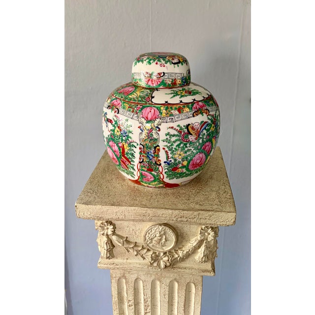 This Chinese Famille Rose ginger jar exemplifies the elegance and decorative richness of traditional Asian ceramics....