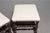 A striking pair of Louis XIII–style French stools crafted in richly toned solid oak, embodying the bold, architectural...