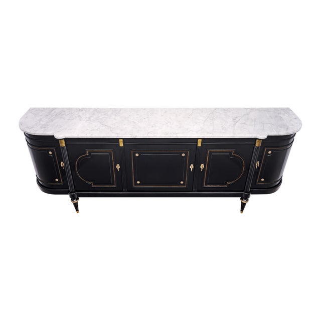 An impressive early 20th century French Louis XVI style mahogany buffet, enfilade or sideboard, combining generous...