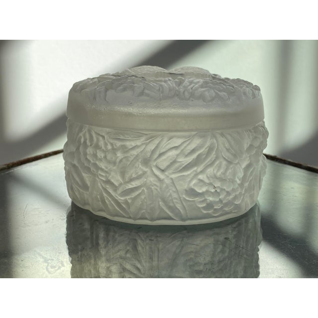 A wonderful late 1920s "Lovebirds" covered glass jar by Reuben Haley for Consolidated Glass Co..