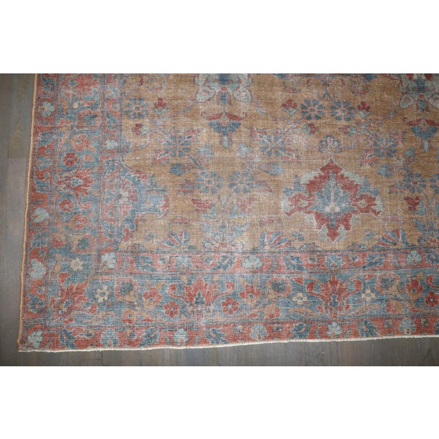 An intermediate size Antique Persian Lilihan early 20th Century Rug