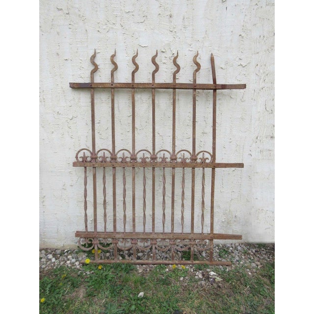 A piece of architectural salvage. Heavy and sturdy. Piece does show signs of age related wear including rust, flaking...