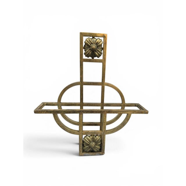 An elegant Art Nouveau magazine and newspaper rack dating from the early 20th century, crafted in gilt brass and designed...