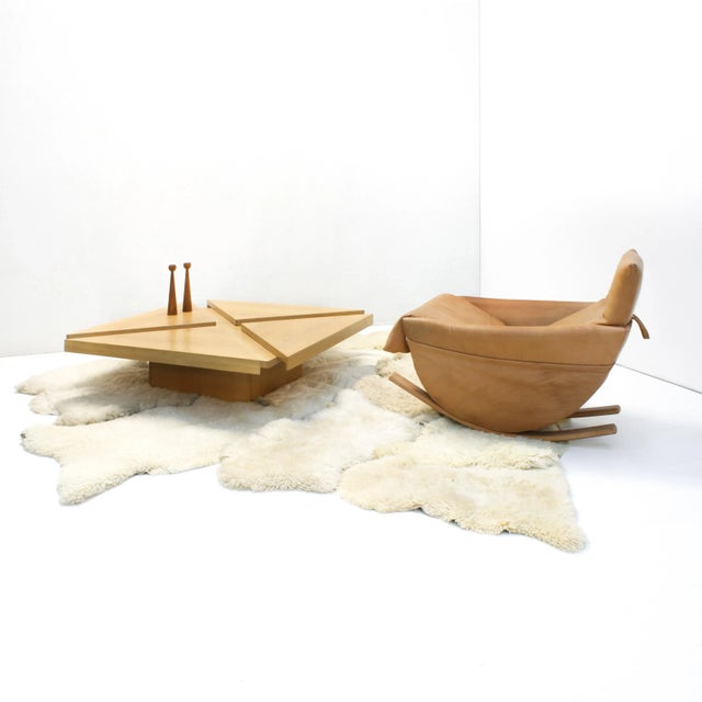 This rare rocking chair was only produced for a short time in the 1970s by de Sede. It comes in natural leather with a...