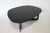 The Insula Cocktail or End Table designed by Ernst & Jensen for Erik Jorgensen is a stunning piece that seamlessly blends...