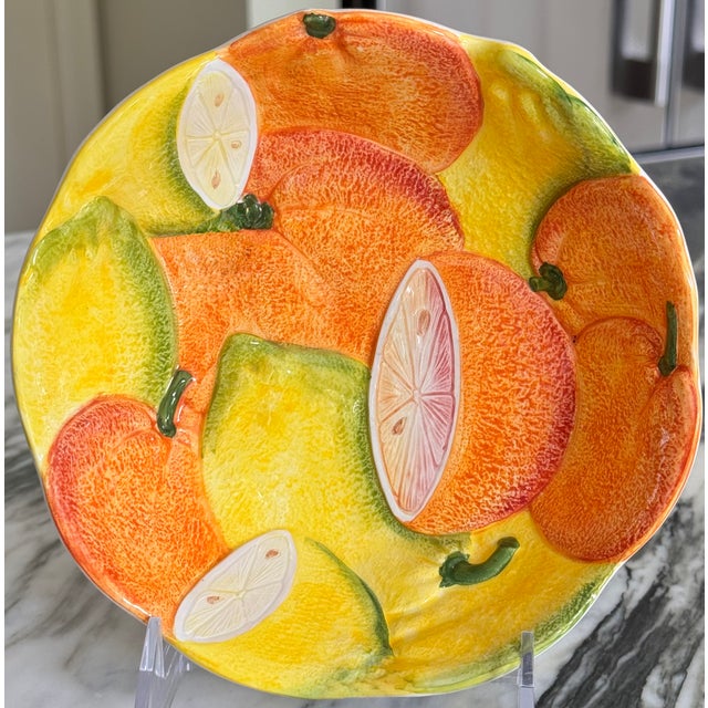 Bring some color of summer into your life with this vibrant citrus motif majolica style serving bowl, reminiscent of...