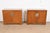An exceptional pair of mid-century modern Hollywood Regency Chinoiserie compact credenzas, sideboard buffets, or bar...