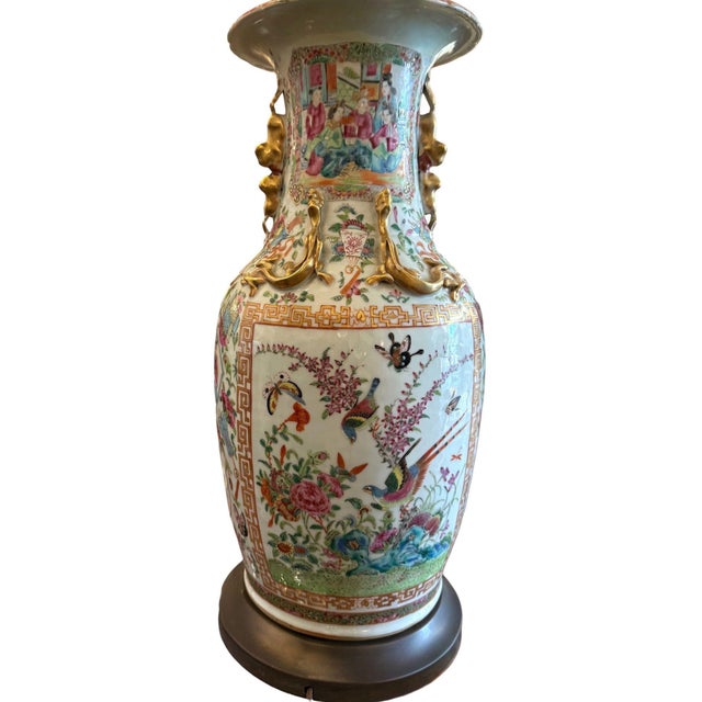 A commanding pair of late-19th-century Chinese Canton famille rose porcelain vases, dating to the late Qing dynasty, circa...