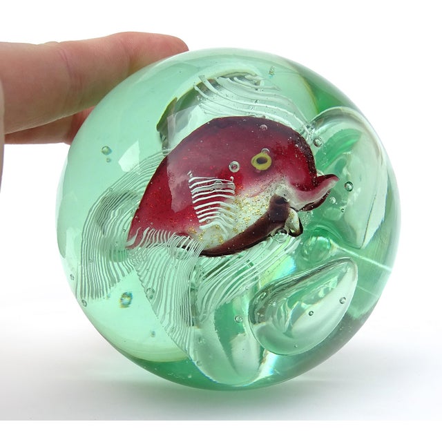 Beautiful vintage Murano hand blown fish in green glass and bubbles Italian art glass paperweight. The piece is created in...