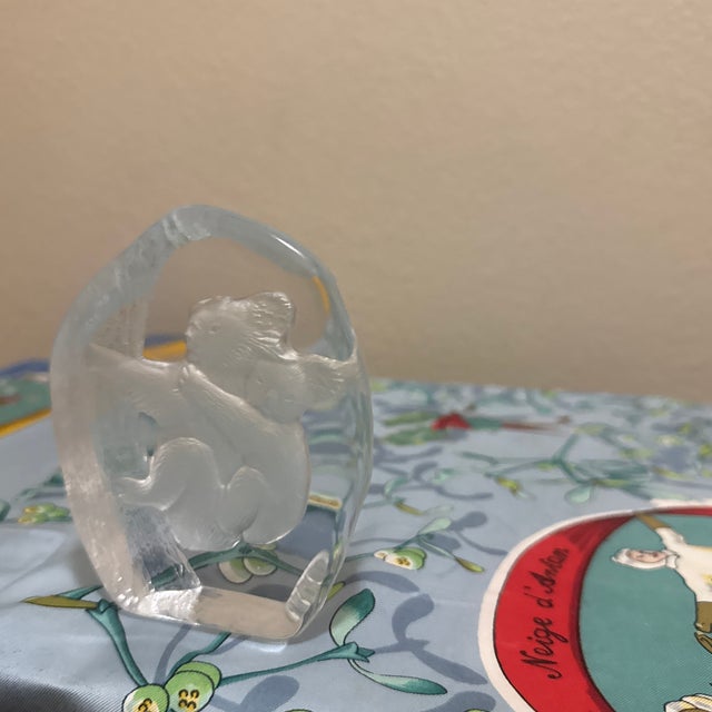 Vintage lead crystal sculpture featuring a reverse-carved frosted koala climbing a tree. This high-quality art glass piece...