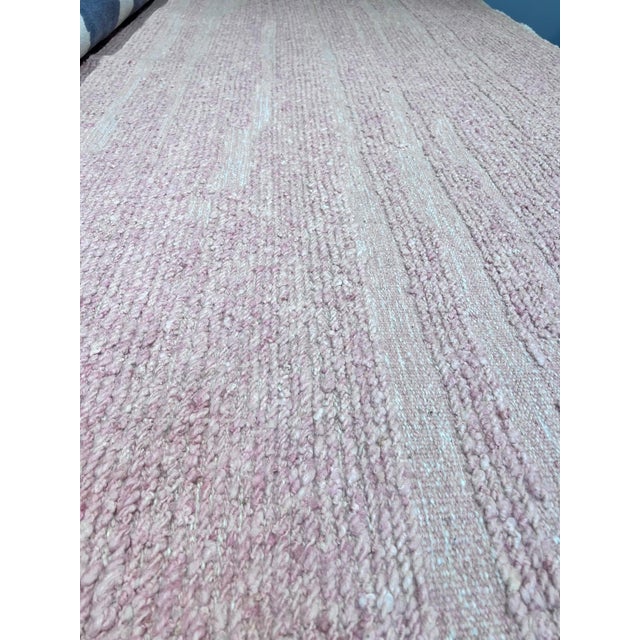 Hand knotted color in hard to find rose pink color. All wool. Being Liquidated.