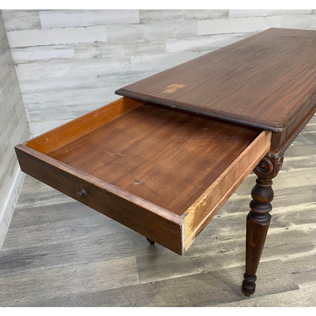 Antique Mahogany writing desk sofa table. Very unique design with fold up top to expose a desk! When desk is not in use it...
