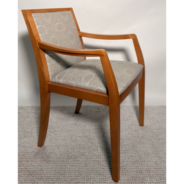 A refined pair of Ansley armchairs by Geiger International, produced for Herman Miller. Defined by a restrained...