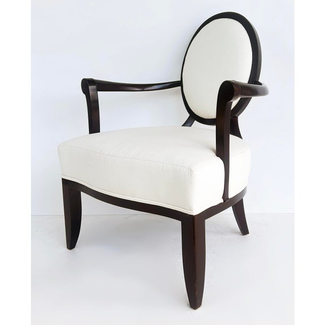 Barbara Barry for Baker Furniture Oval X-Back Club Chair Offered for sale is an elegant upholstered club by Barbara Barry...